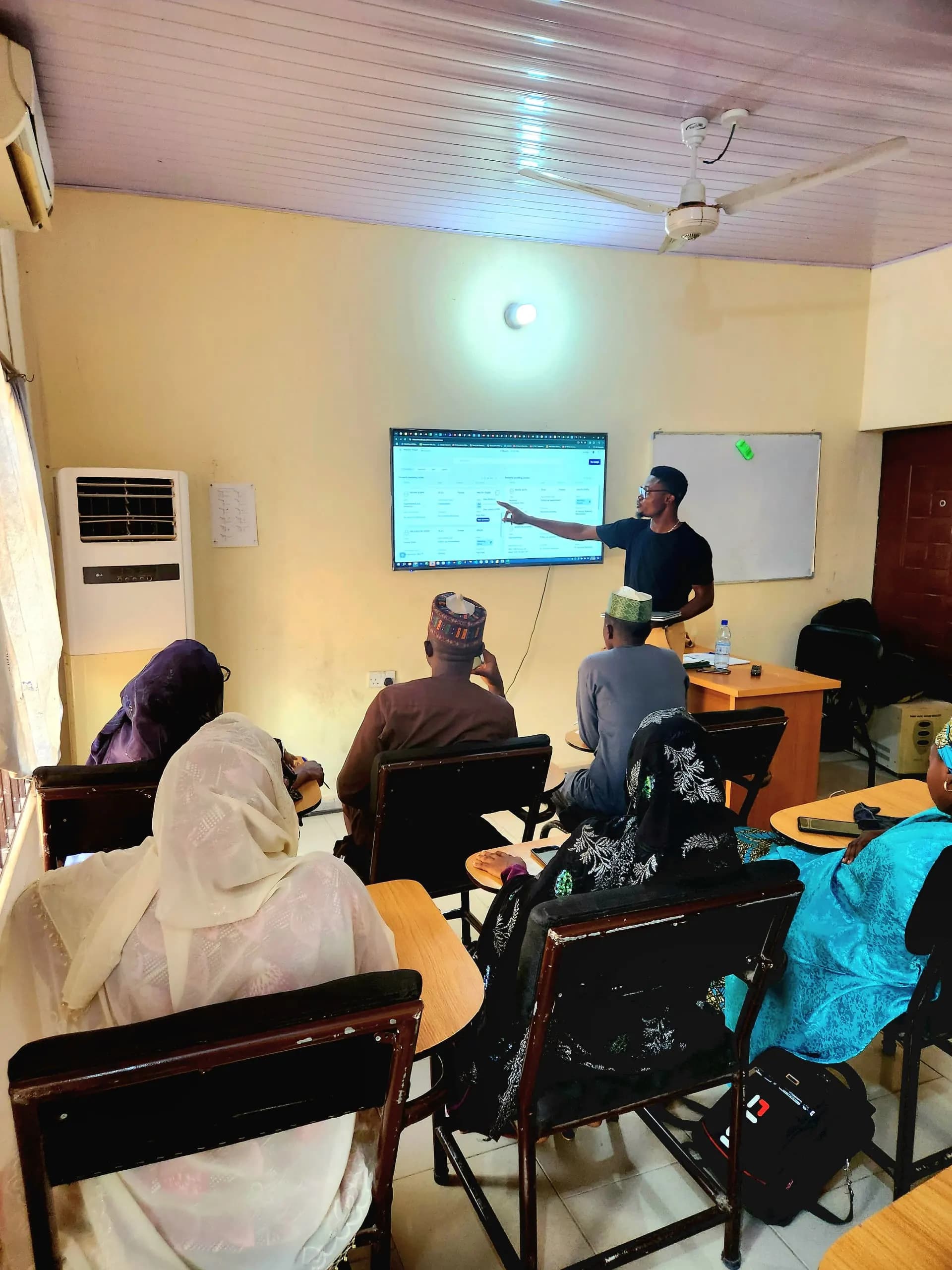 Team receiving on‑screen instruction